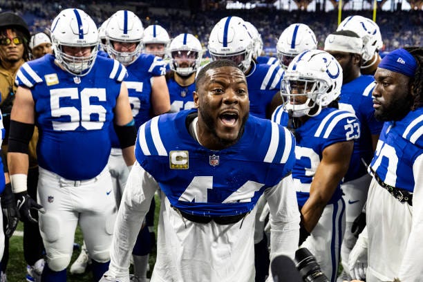 Zaire Franklin of the Indianapolis Colts leads the huddle before the game against the Tampa Bay Buccaneers at Lucas Oil Stadium on November 26, 2023...