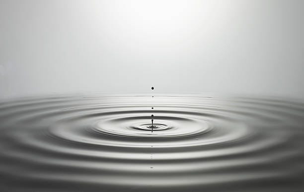 droplet impact - ripples water stock pictures, royalty-free photos & images