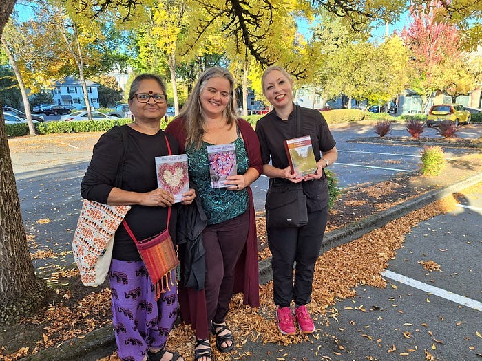 Vidya Sury, Collecting Smiles, Trista Signe Ainsworth, and Dr. Gabriella Korosi holding DEP-published books in Portland, Oregon Vidya Sury, Collecting Smiles, Trista Signe Ainsworth, and Dr. Gabriella Korosi holding DEP-published books in Portland, Oregon