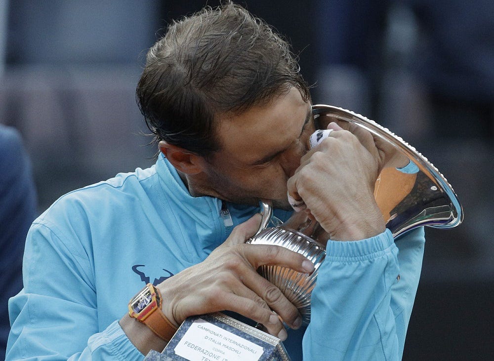 rafael nadal kisses italian open trophy beating djokovic 2019