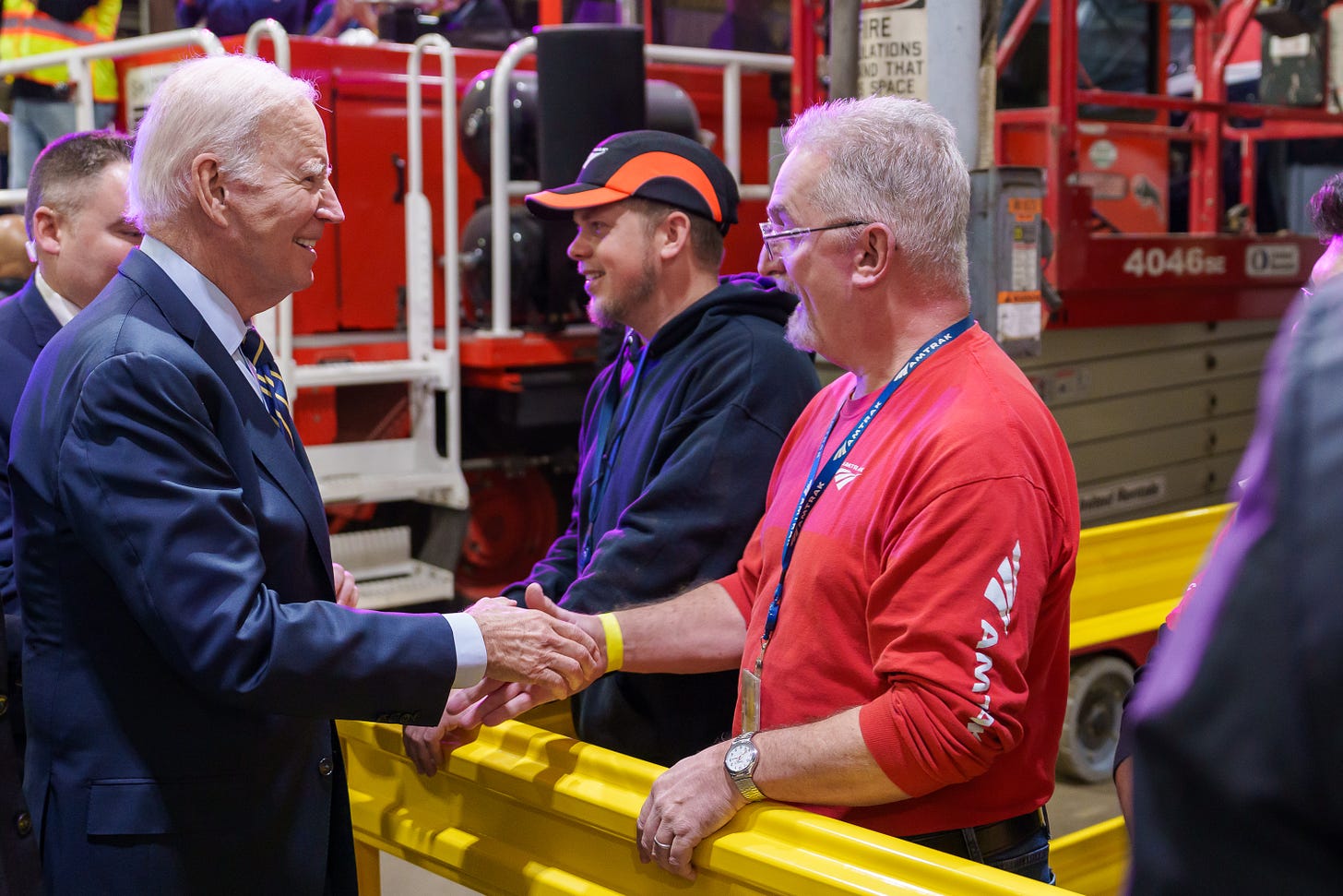 President Biden greets event attendees and Amtrak workers in Bear, Delaware.