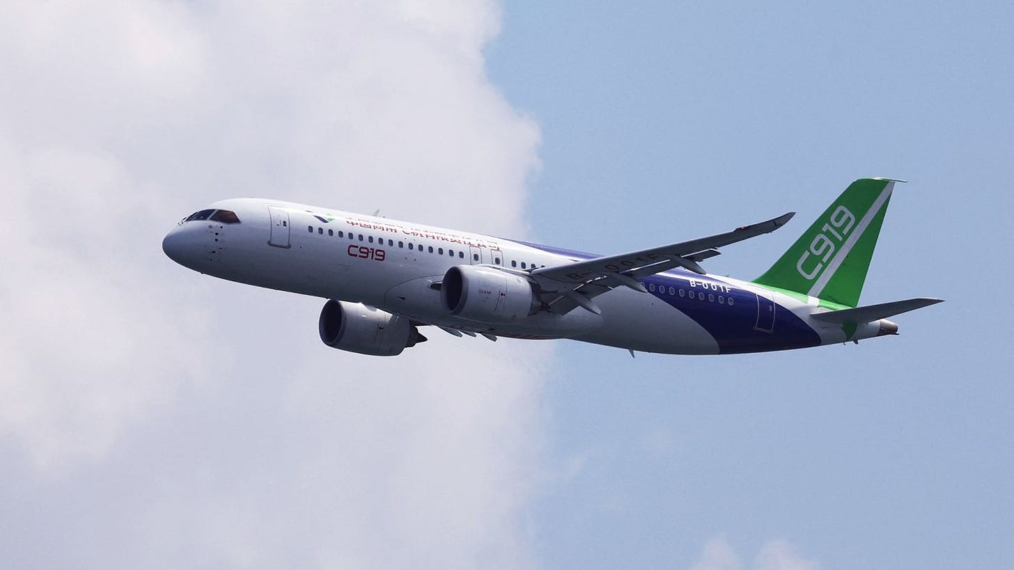 The C919 conducts a flyby at the Singapore Airshow at Changi Exhibition Centre on February 18, 2024.