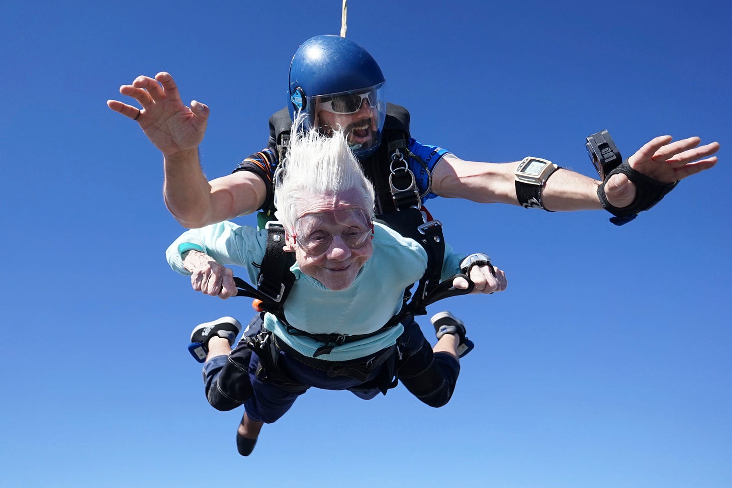 Dorothy Hoffner, 104, falls through the air with tandem jumper Derek Baxter as she becomes the oldest person in the world to skydive.