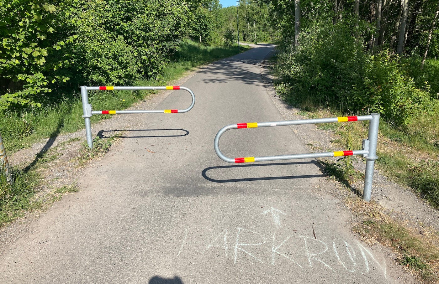 PARKRUN chalked on the floor to show the walk from the bus stop