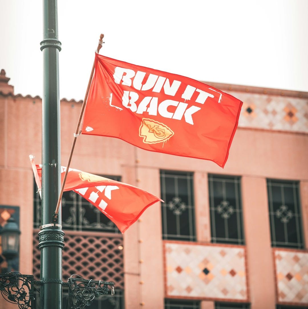 red and white flag on pole