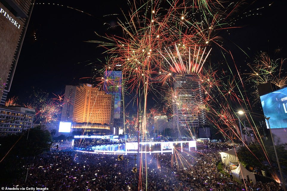 BUNDARAN HI: Fireworks light up the night sky over Bundaran HI to welcome the New Year 2025, as crowds of all ages gather to celebrate in Jakarta, Indonesia on January 01, 2025