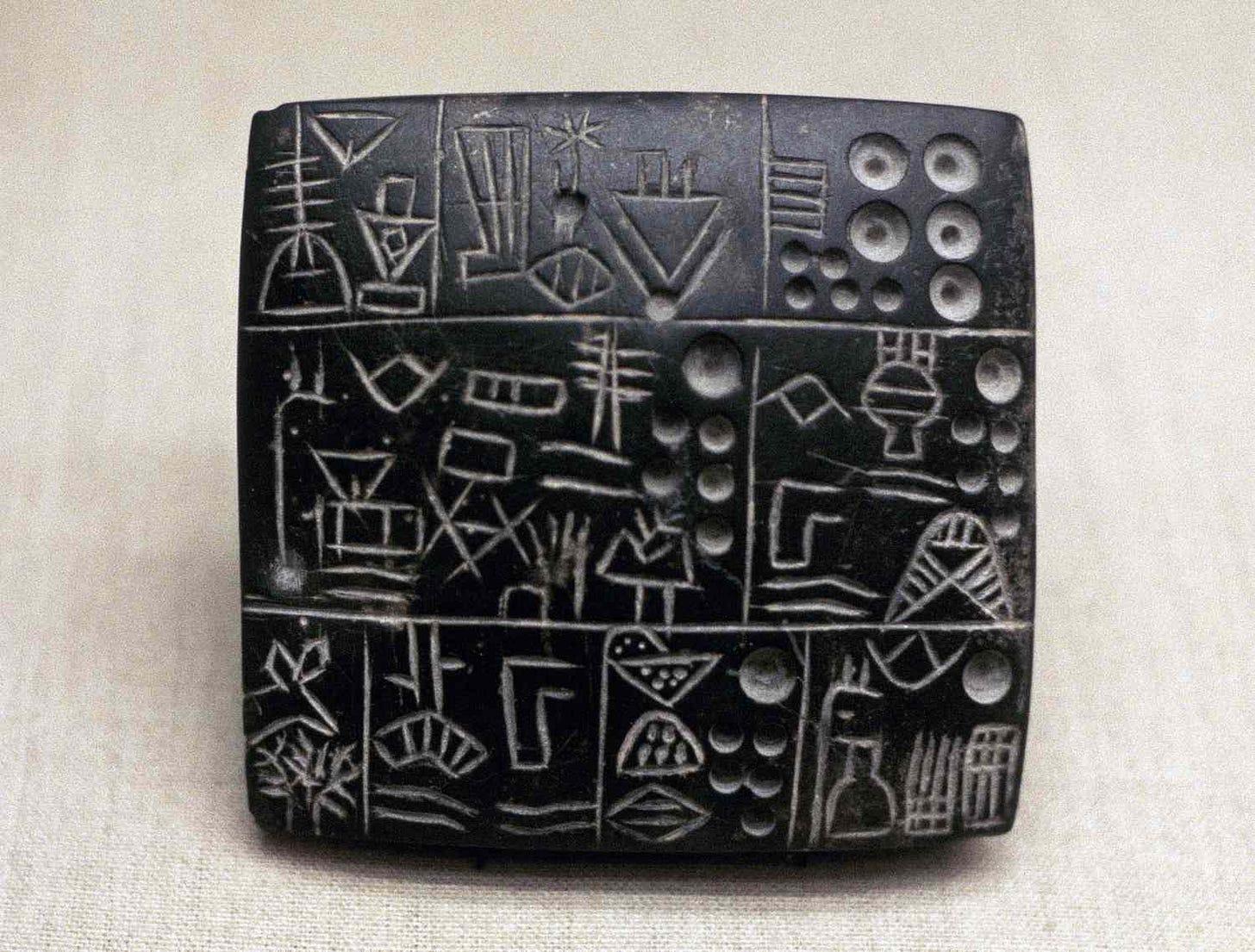 Mesopotamian Tablet with Uruk IV Proto-Cuneiform Writing, ca 3200 BC Mesopotamian Tablet with Uruk IV Proto-Cuneiform Writing, ca 3200 BC