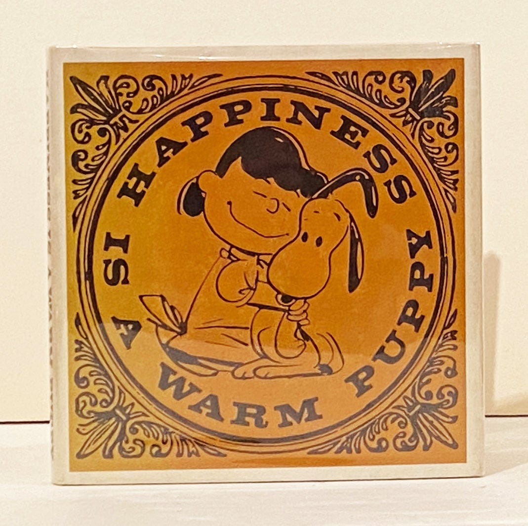 Happiness Is A Warm Puppy | Charles M. Schulz | First Edition