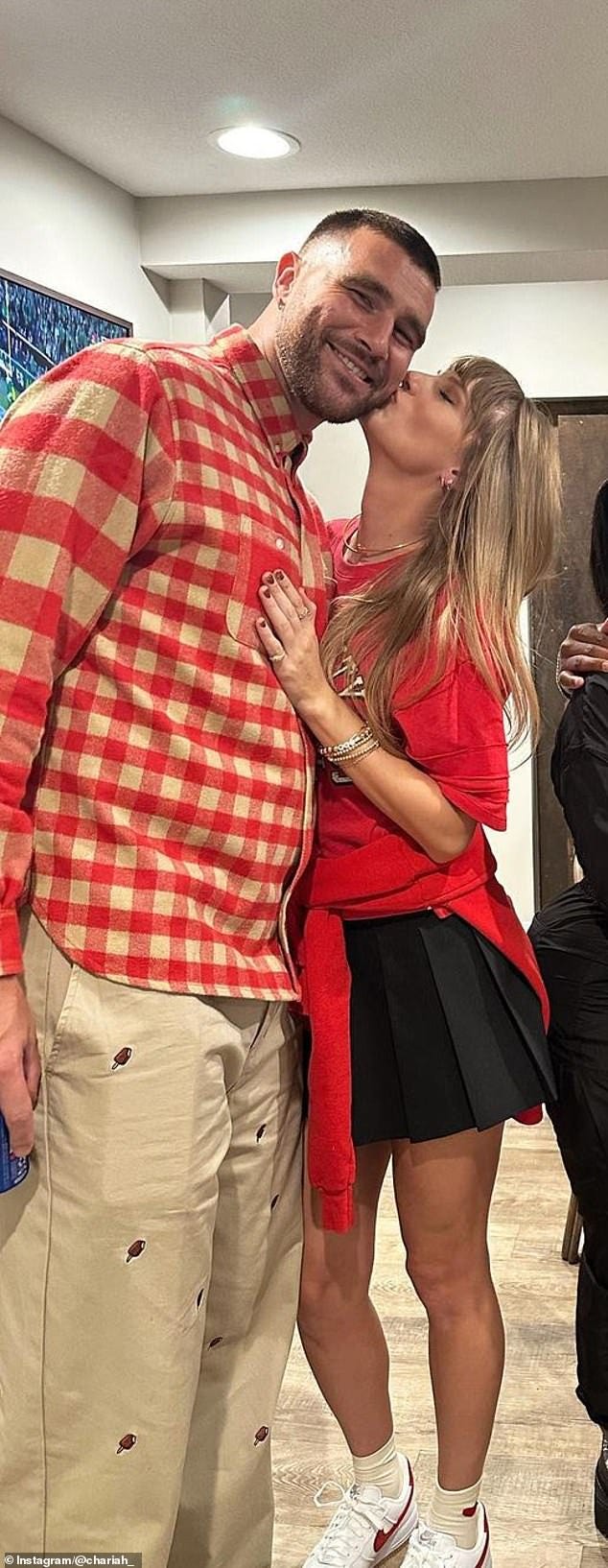 Taylor Swift's fans spot one detail about her first kiss picture with Travis  Kelce that proves she was REALLY in the mood for romance | Daily Mail Online