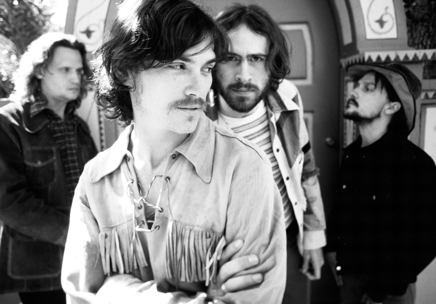 Black and white photo of the band Stillwater from Almost Famous.