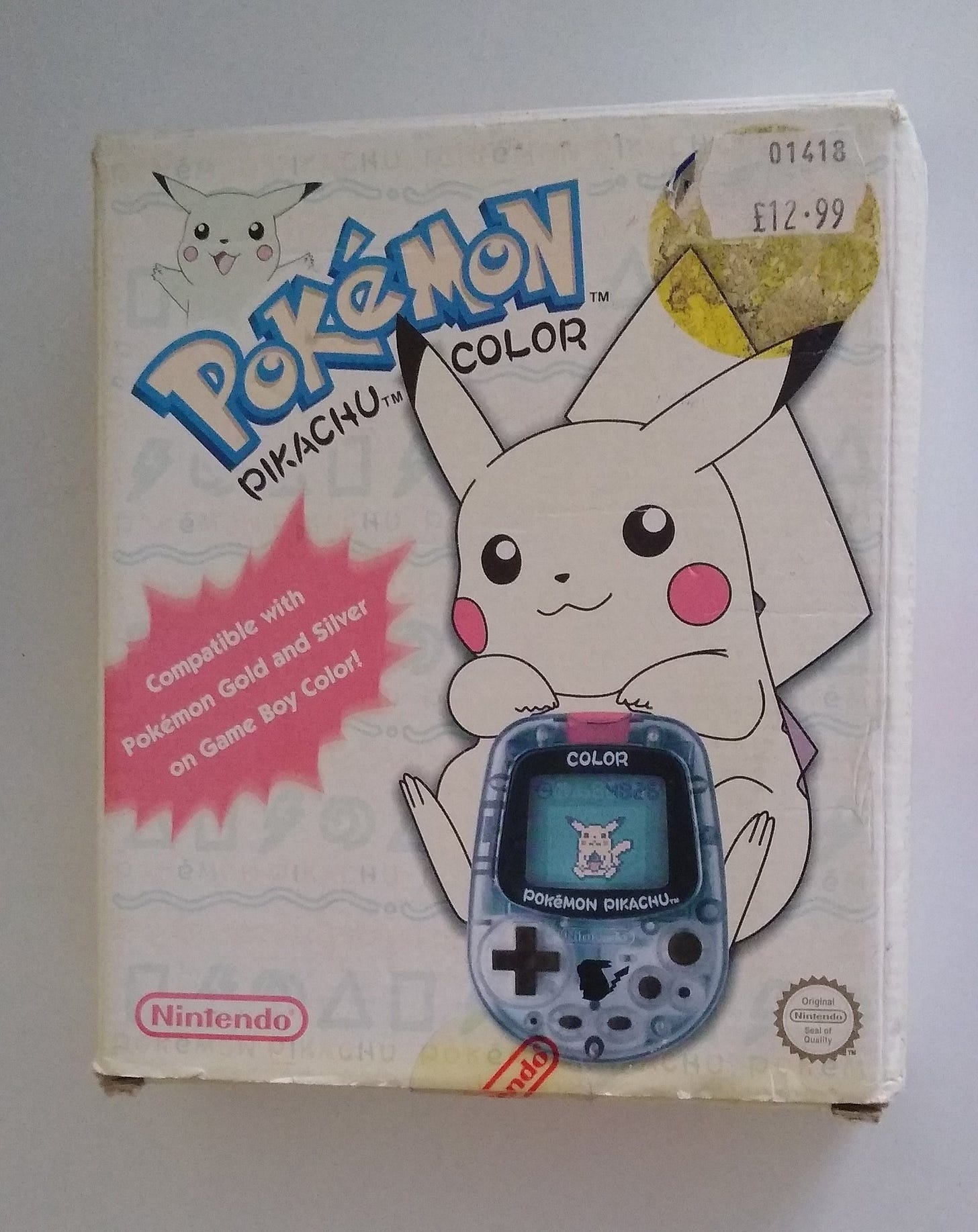 My boxed European Pokémon Pikachu Color, faded due to sunlight