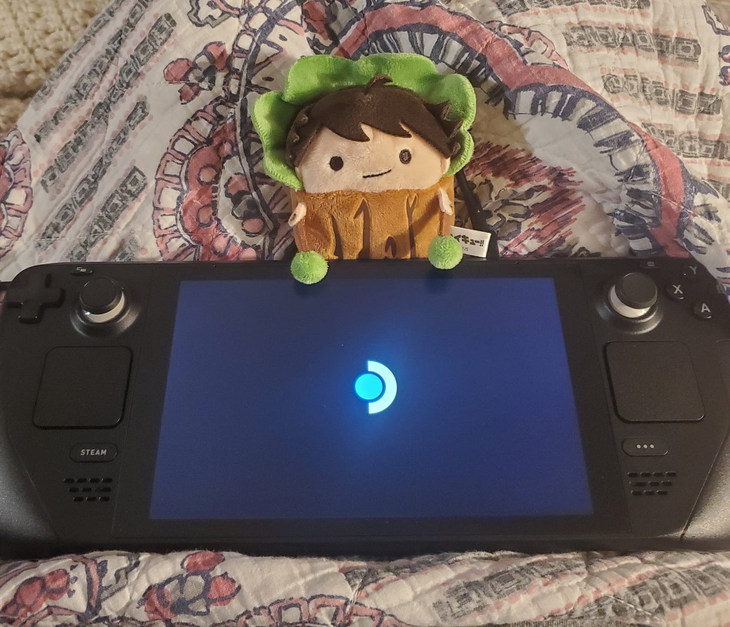 Tree Oikawa plush on top of a steam deck