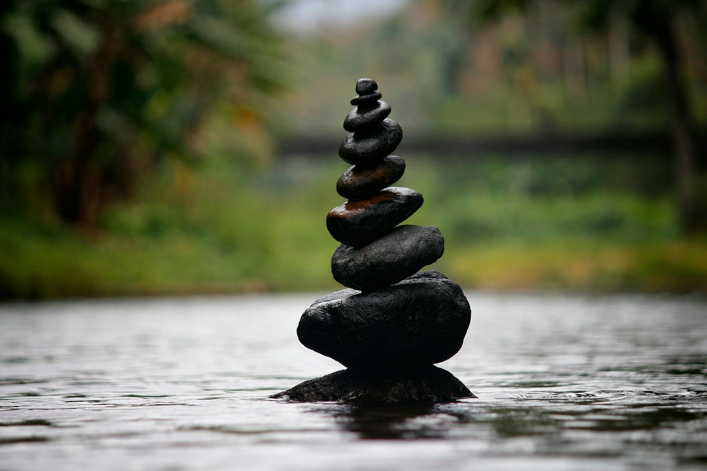 https://www.pexels.com/photo/black-stackable-stone-decor-at-the-body-of-water-312839/