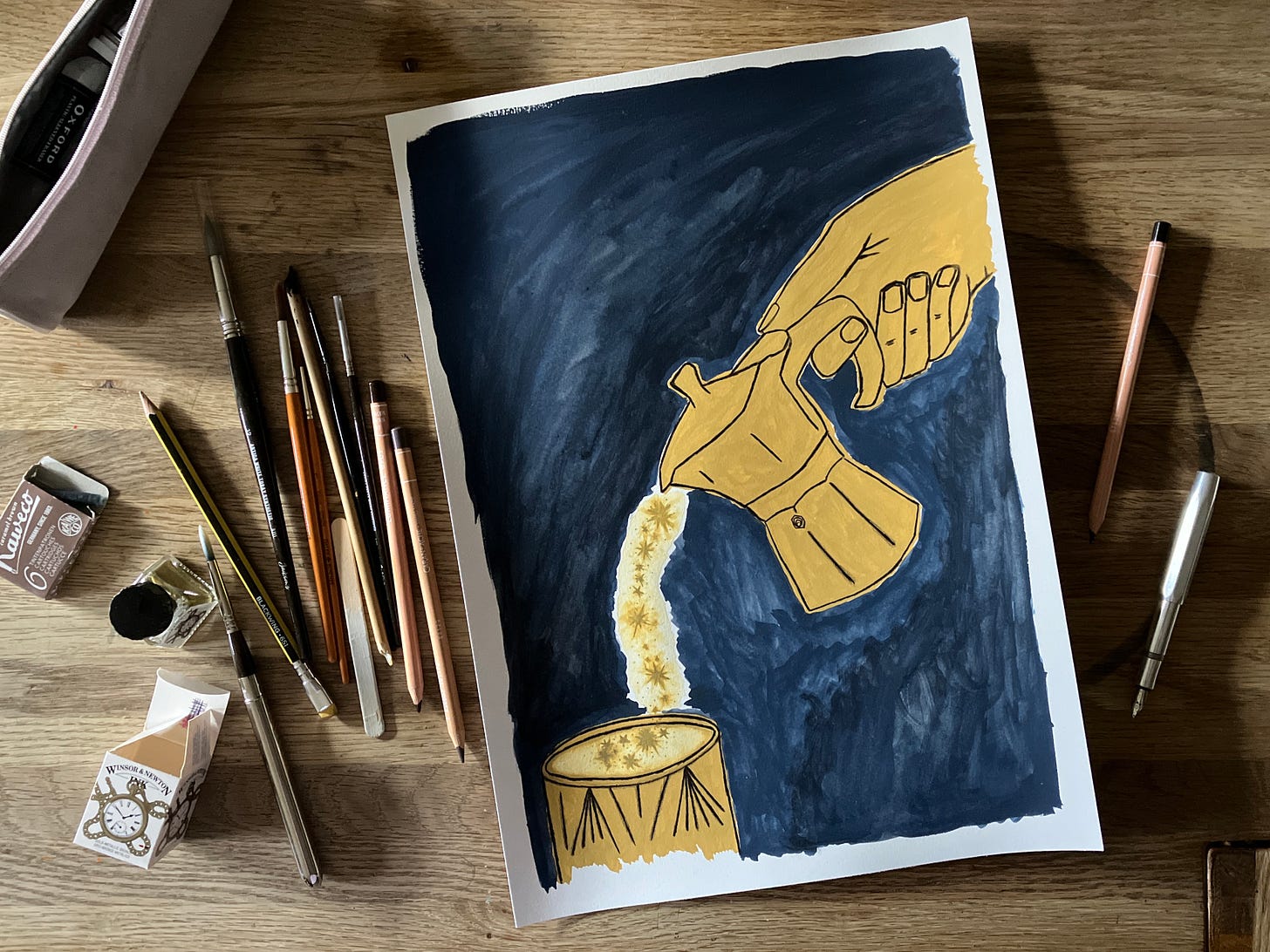 Painting of coffee pot pouring stars sits atop a desk surrounded by art materials