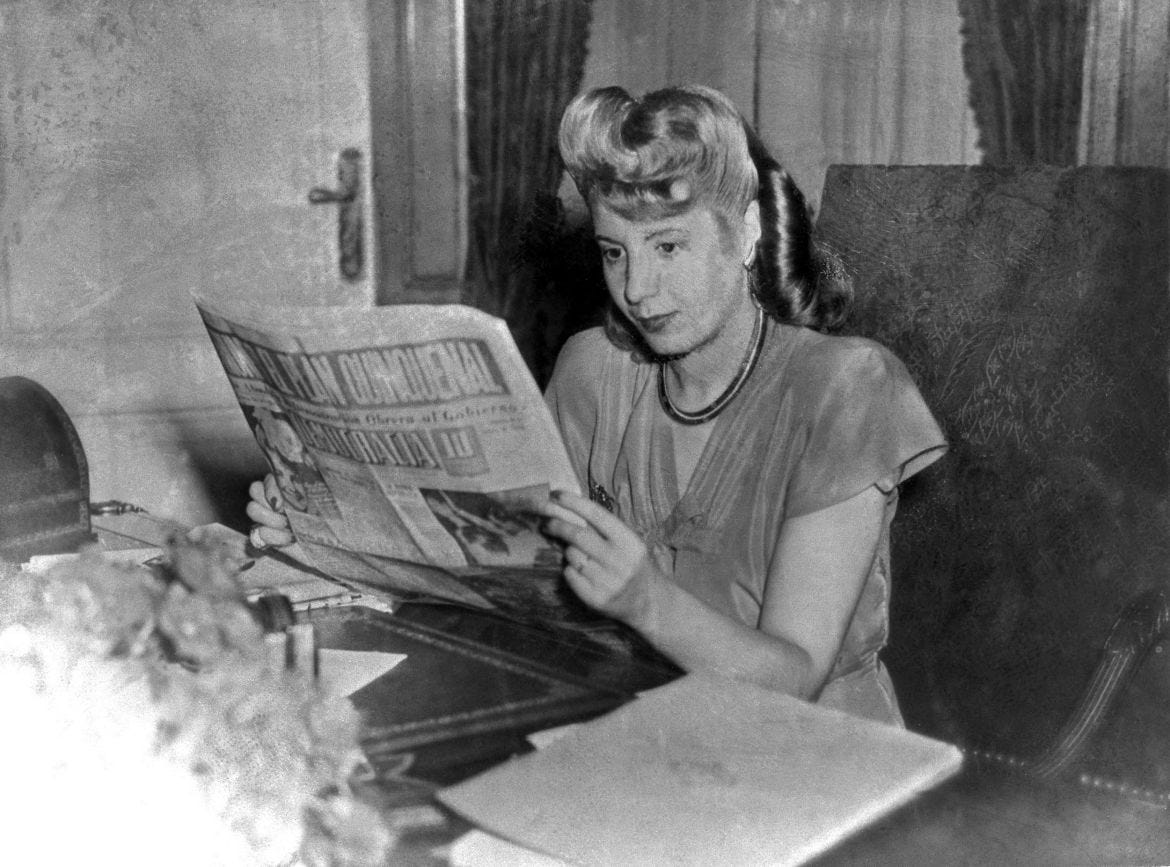File picture taken in 1947 showing Eva Peron reading a newspaper. Eva Peron, known as Evita (1919-1952), the second wife of Argentine President Juan Peron, was a radio and screen actress before her marriage in 1945. She became a powerful political influence and a mainstay of the Peron government. She was idolized by the poor, and after her death, in Buenos Aires, support for her husband waned. (Photo by AFP) File picture taken in 1947 showing Eva Peron reading a newspaper. Eva Peron, known as Evita (1919-1952), the second wife of Argentine President Juan Peron, was a radio and screen actress before her marriage in 1945. She became a powerful political influence and a mainstay of the Peron government. She was idolized by the poor, and after her death, in Buenos Aires, support for her husband waned. (Photo by AFP)