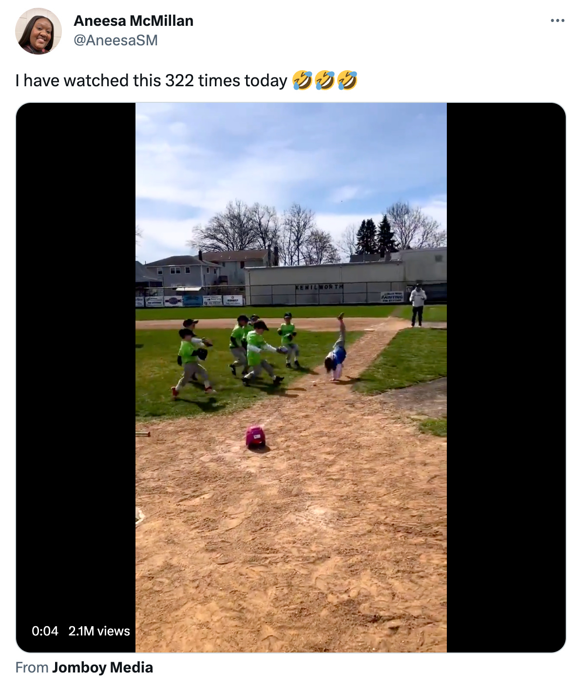 Screengrab of girl doing a cartwheel on a baseball field