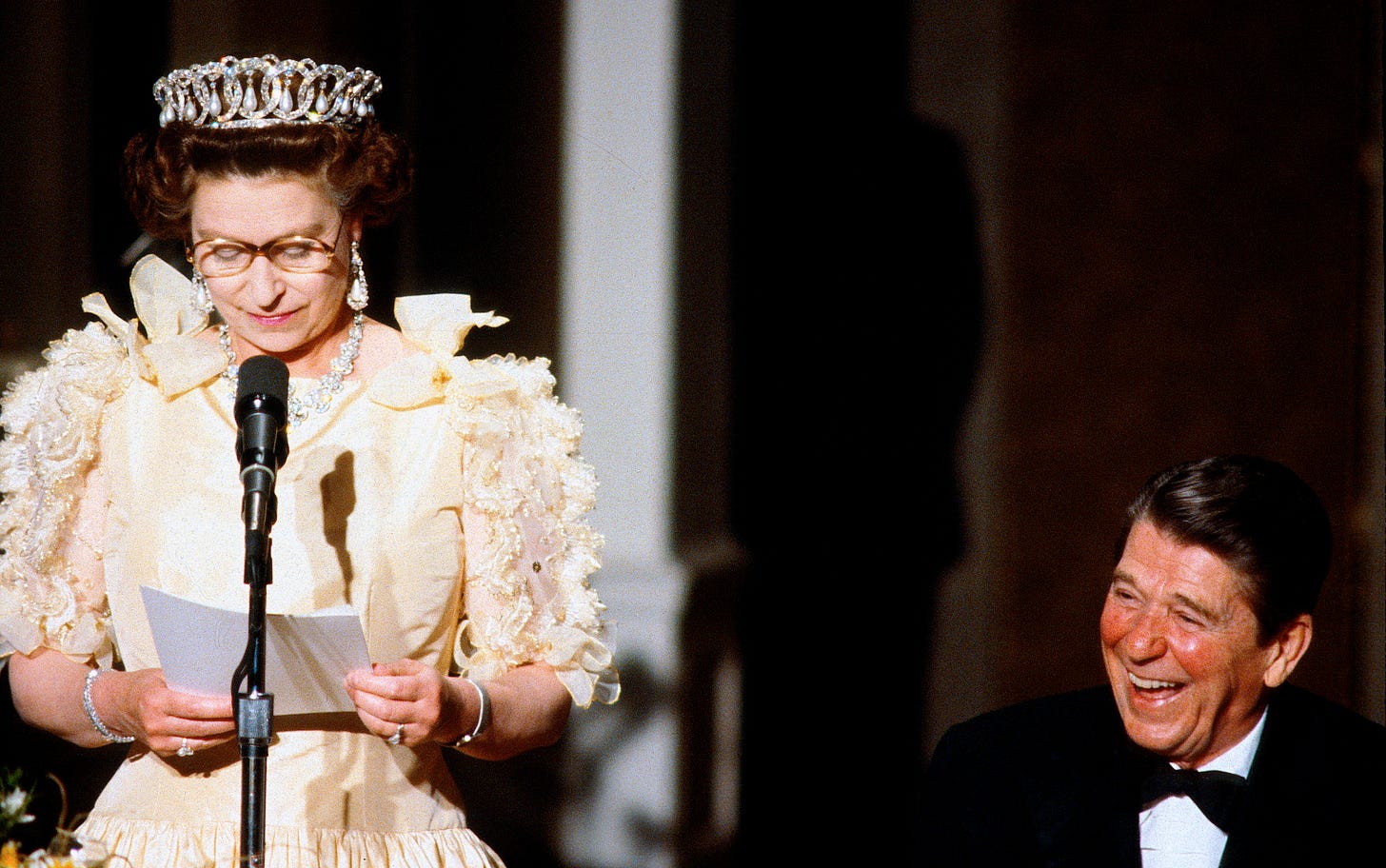 President Ronald Reagan laughs after Queen Elizabeth II delivers speech