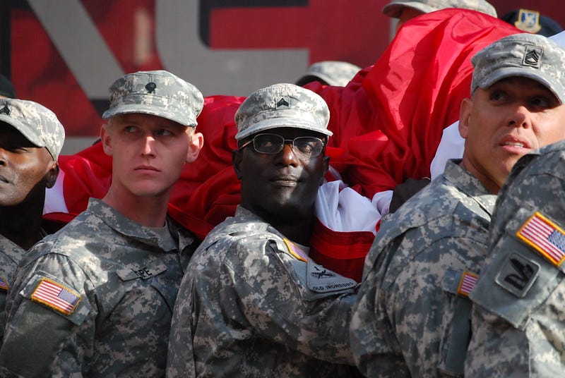California National Guard members unfurl the flag at the 49ers home opener in 2016. Image: California National Guard. California National Guard members unfurl the flag at the 49ers home opener in 2016. Image: California National Guard.