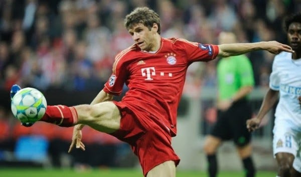 thomas muller kicking soccer top 2014 bulge men