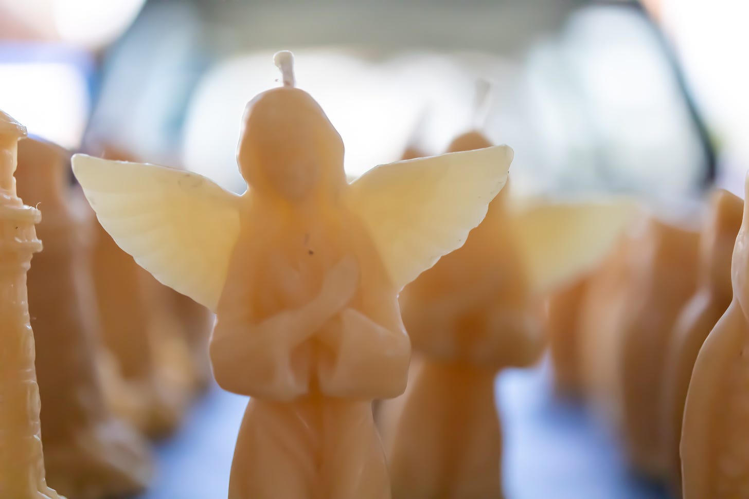 beeswax candles in the shape of angels