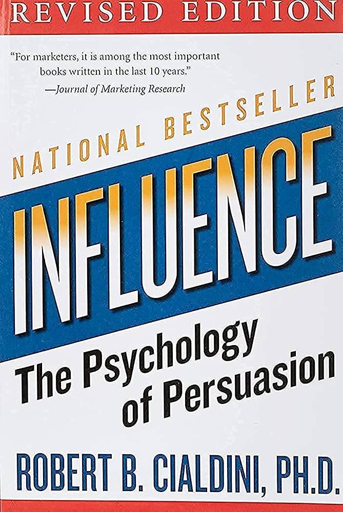 May be an image of text that says "REVISED EDITION "For marketers, it is among the most important books written in the last 10 -Journal of Marketing Research RESTSELLER years." NATIONAL FLUENCE The of Psychology Persuasion ROBERT B. CIALDINI, PH.D."