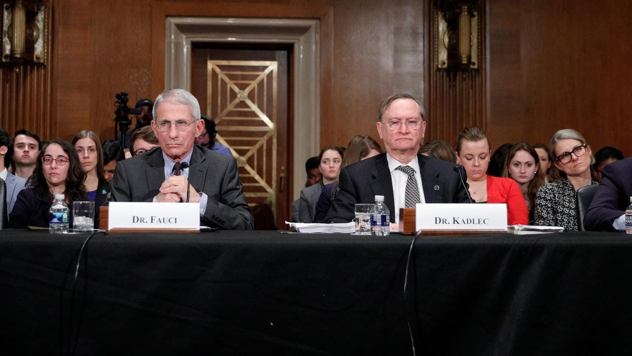 Dr Robert Kadlec, right, and Dr Fauci testify before a Senate Health Committee hearing on the US response to Covid on Capitol Hill on March 3, 2020.