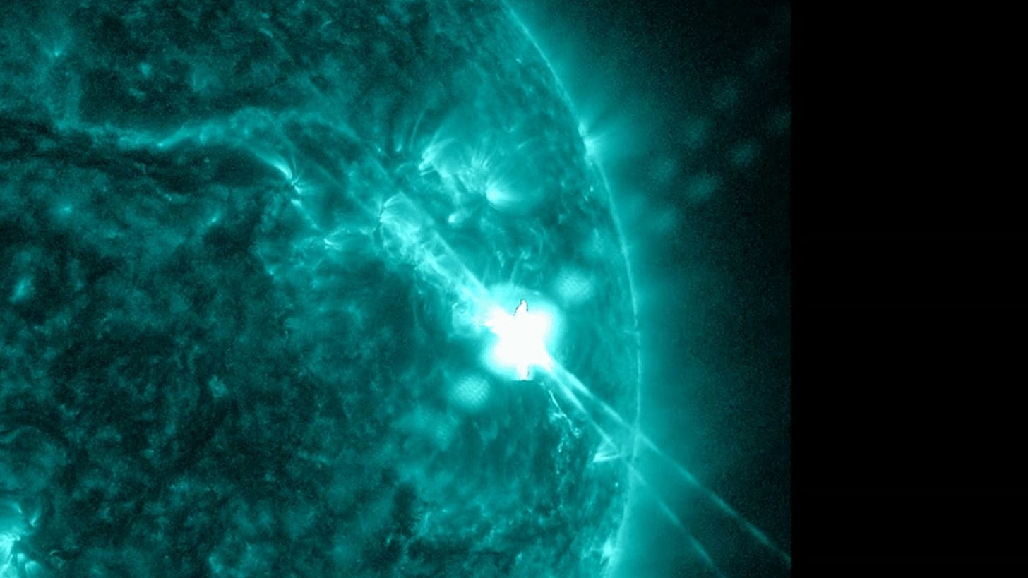 NASA’s Solar Dynamics Observatory captured this image of a solar flare – as seen in the bright flash in the upper right – on Dec. 14. The image shows a subset of extreme ultraviolet light that highlights the extremely hot material in flares, and which is colorized in teal. NASA’s Solar Dynamics Observatory captured this image of a solar flare – as seen in the bright flash in the upper right – on Dec. 14. The image shows a subset of extreme ultraviolet light that highlights the extremely hot material in flares, and which is colorized in teal.
