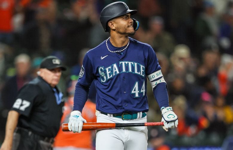 Seattle Mariners center fielder Julio Rodriguez reacts after striking out swinging by Houston Astros relief pitcher Ryan Pressly in thee eighth inning Wednesday night at T-Mobile Park in Seattle, Washington on September 27, 2023.  (Kevin Clark / The Seattle Times)