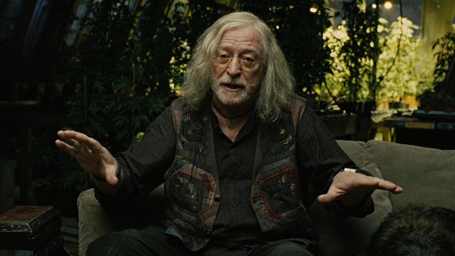 Shot of Michael Caine in Children of Men sitting on a couch. He's probably calling Clive Owen 'Amigo' in this moment.