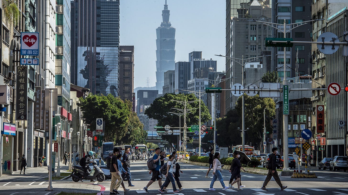 Passersby walk in Taipei, China's Taiwan region, November 28, 2023. /CFP