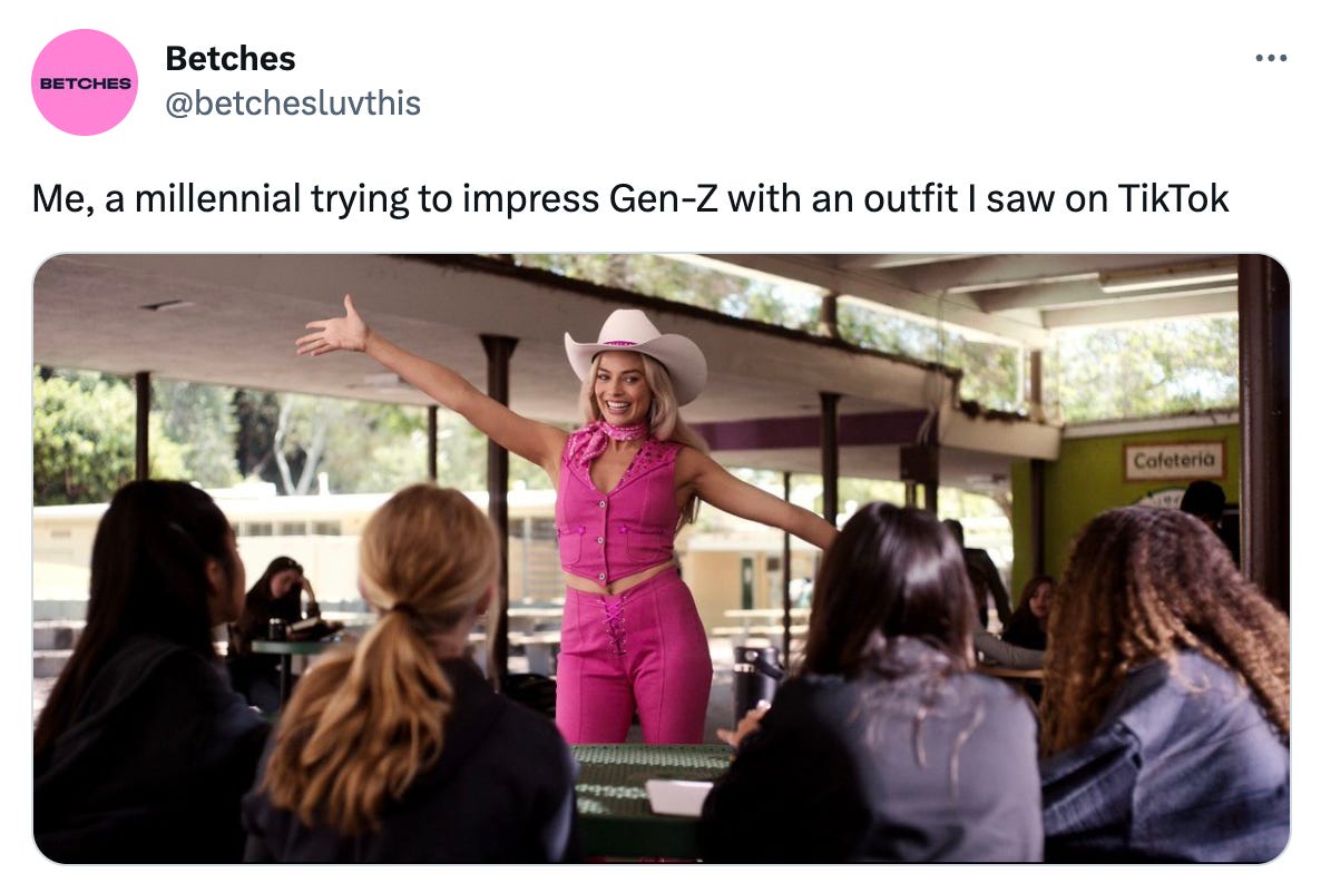 A tweet from Betches (@betchesluvthis) that reads "Me, a millennial trying to impress Gen-Z with an outfit I saw on TikTok" and shows an image from the Barbie movie of Barbie in a pink western outfit in front of a bunch of teenagers in black in a cafeteria.