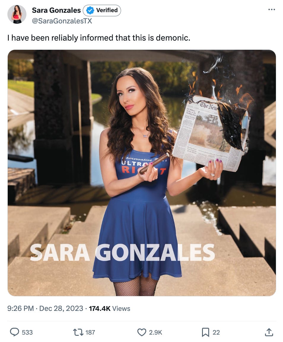 Sara Gonzales: I have been reliably informed that this is demonic. Picture of a brunette lady in a tight dress burning the new york times