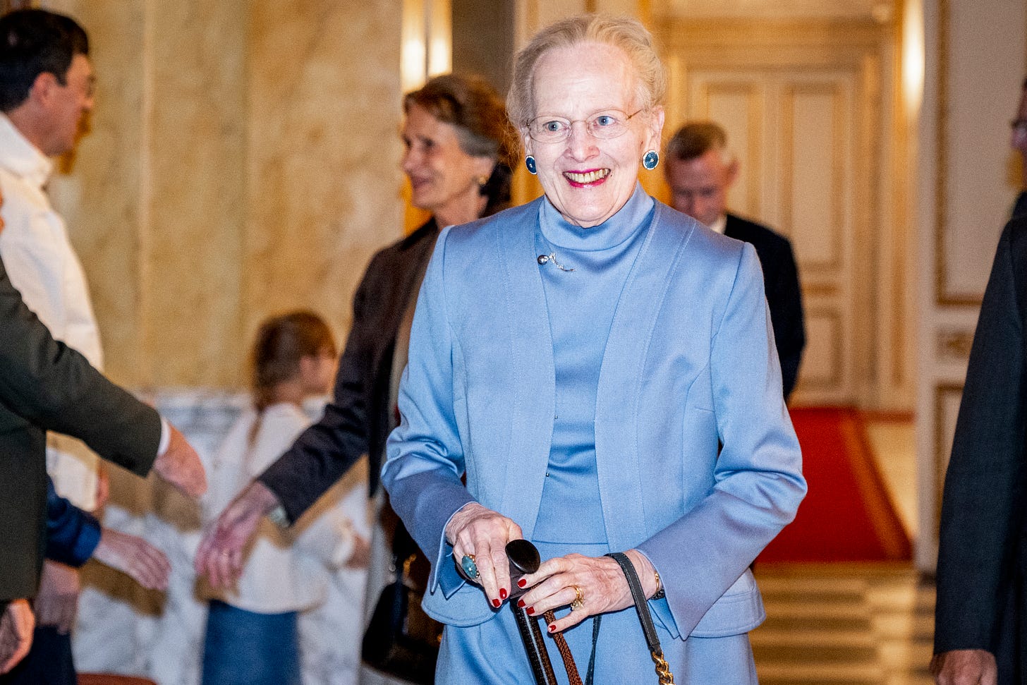 Queen Margrethe in a blue dress
