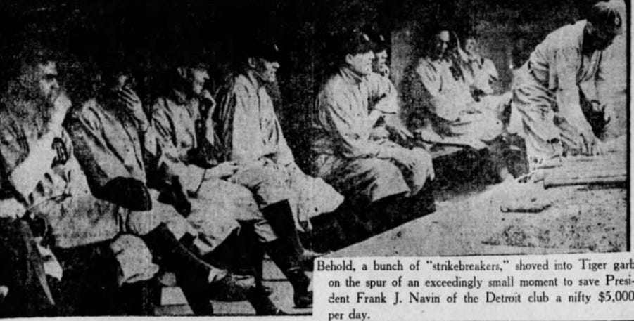 The replacement Tigers in uniform sitting on their bench.