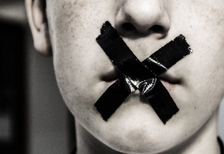 A taped up mouth A taped up mouth
