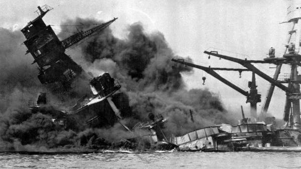 Smoke billows from the USS Arizona after a Japanese attack on Pearl Harbor in this Dec. 7, 1941 file photo. The attack triggered the U.S. entry into World War II. AP Photo/U.S. Navy