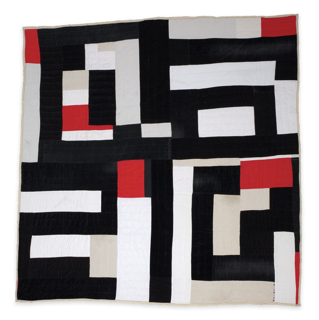 Black, white, and red Blocks and Strips quilt made of courdroy by Mary Lee Bendolph