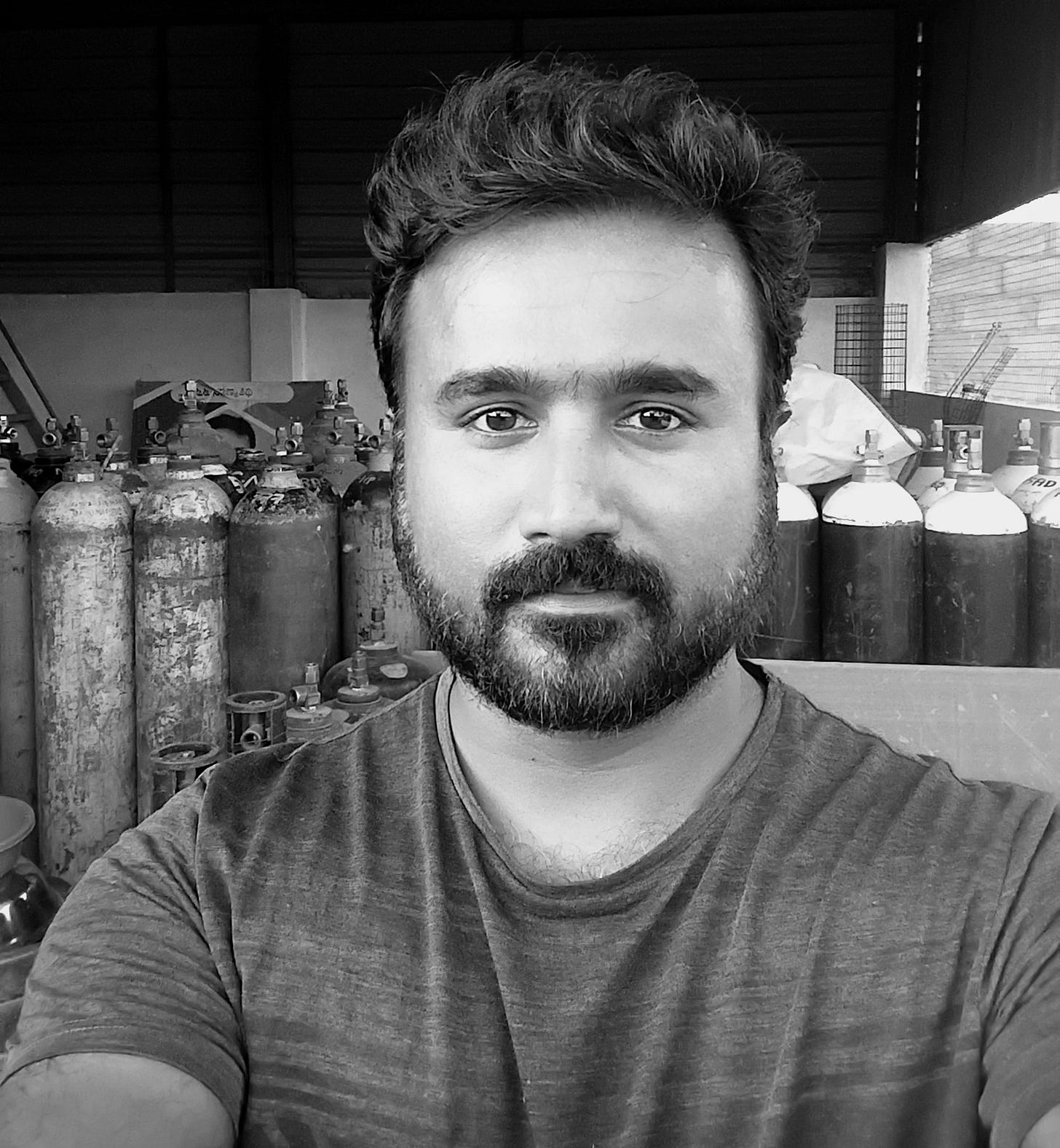 May be a black-and-white image of 1 person and beard