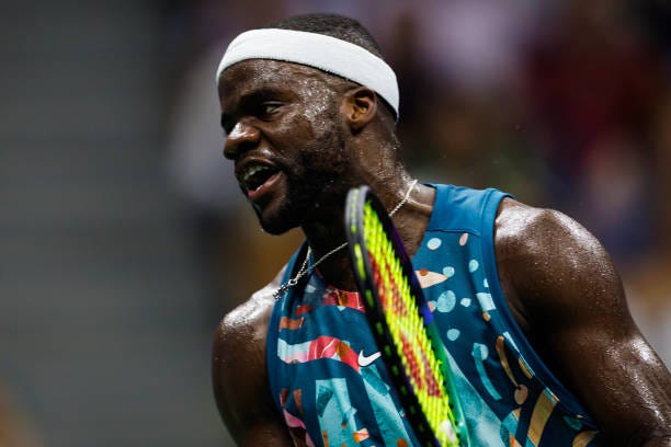 Frances Tiafoe of the United States reacts after losing a point against Ben Shelton of the United States in the quarter-finals of the US Open at the...