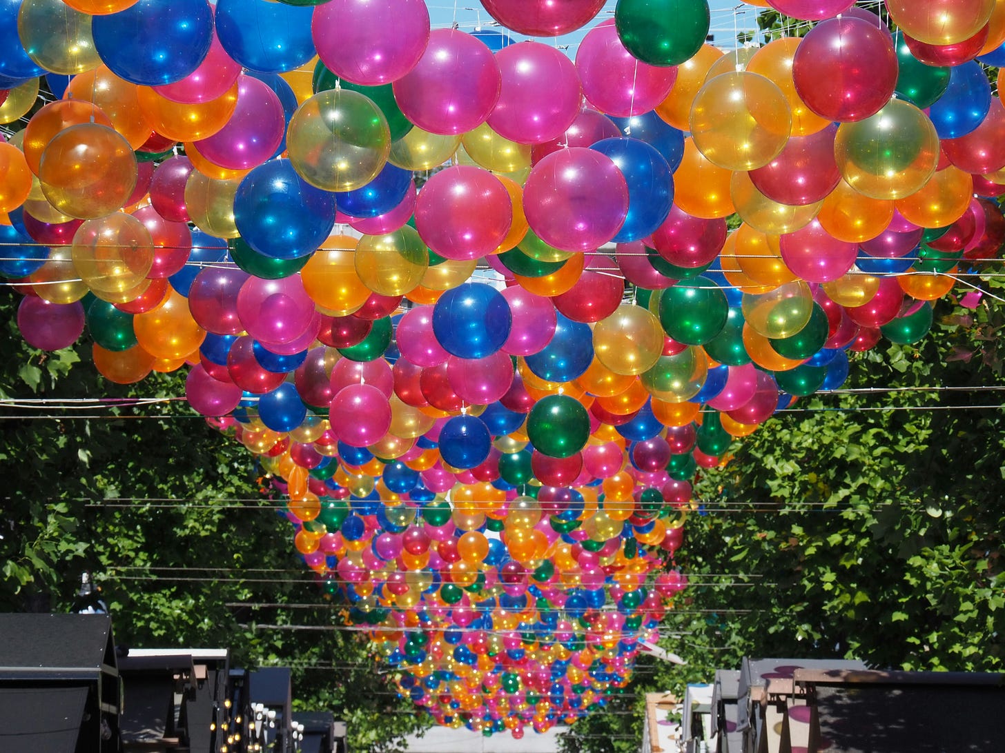 colorful balloons celbrating a community of writers over 60 colorful balloons celbrating a community of writers over 60