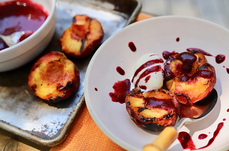 Grilled Peaches with Vanilla Ice Cream and Berry Sauce