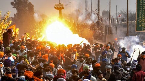 A tear gas explodes after being fired upon the protesting farmers during their 'Delhi Chalo' march, near the Punjab-Haryana Shambhu Border, in Patiala district, Wednesday, Feb. 21, 2024