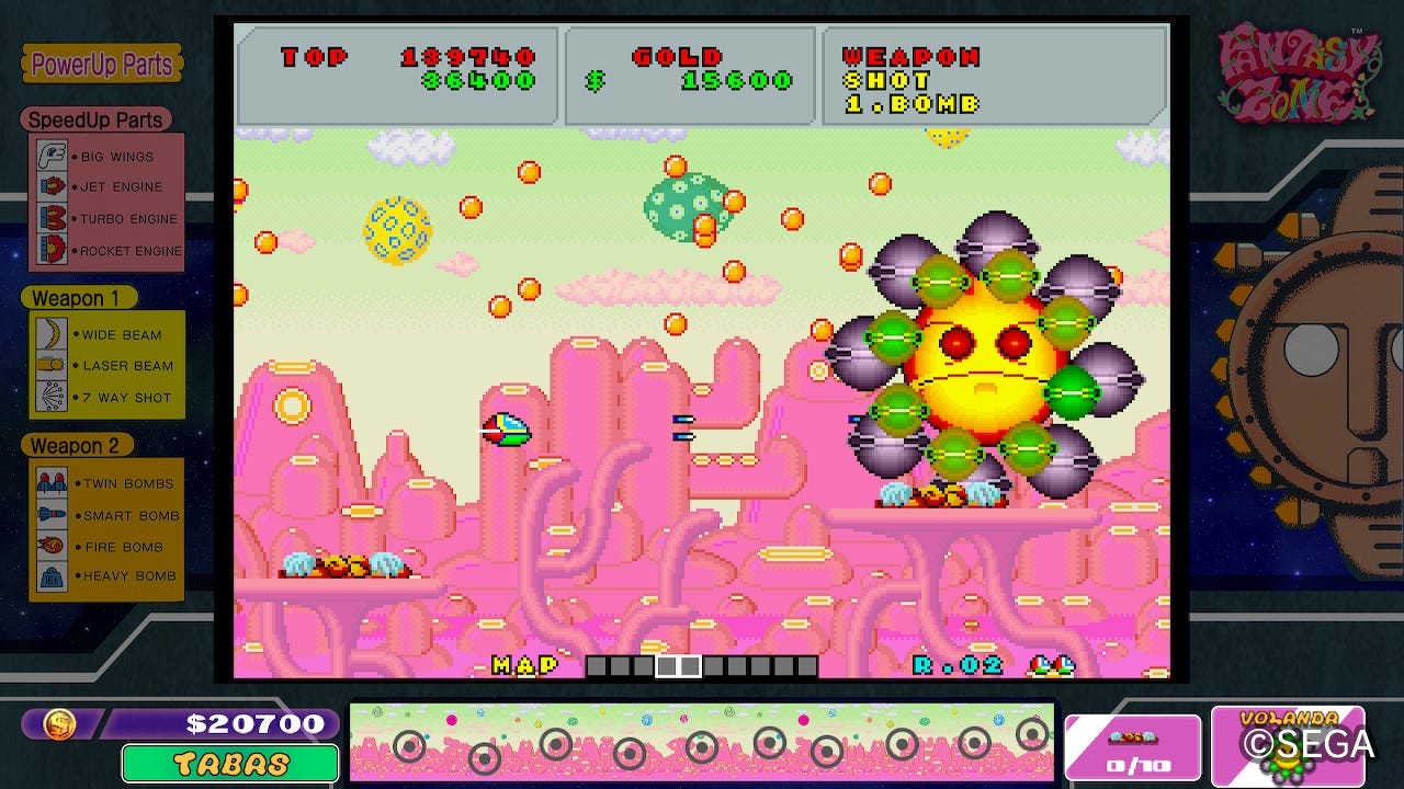 A screenshot from the Switch's Sega Ages edition of Fantasy Zone, showing off the boss fight against stage 2's Volanda, a bell which surrounds itself with smaller rotating bells as a shield, and fires waves of bullets that drop from above.