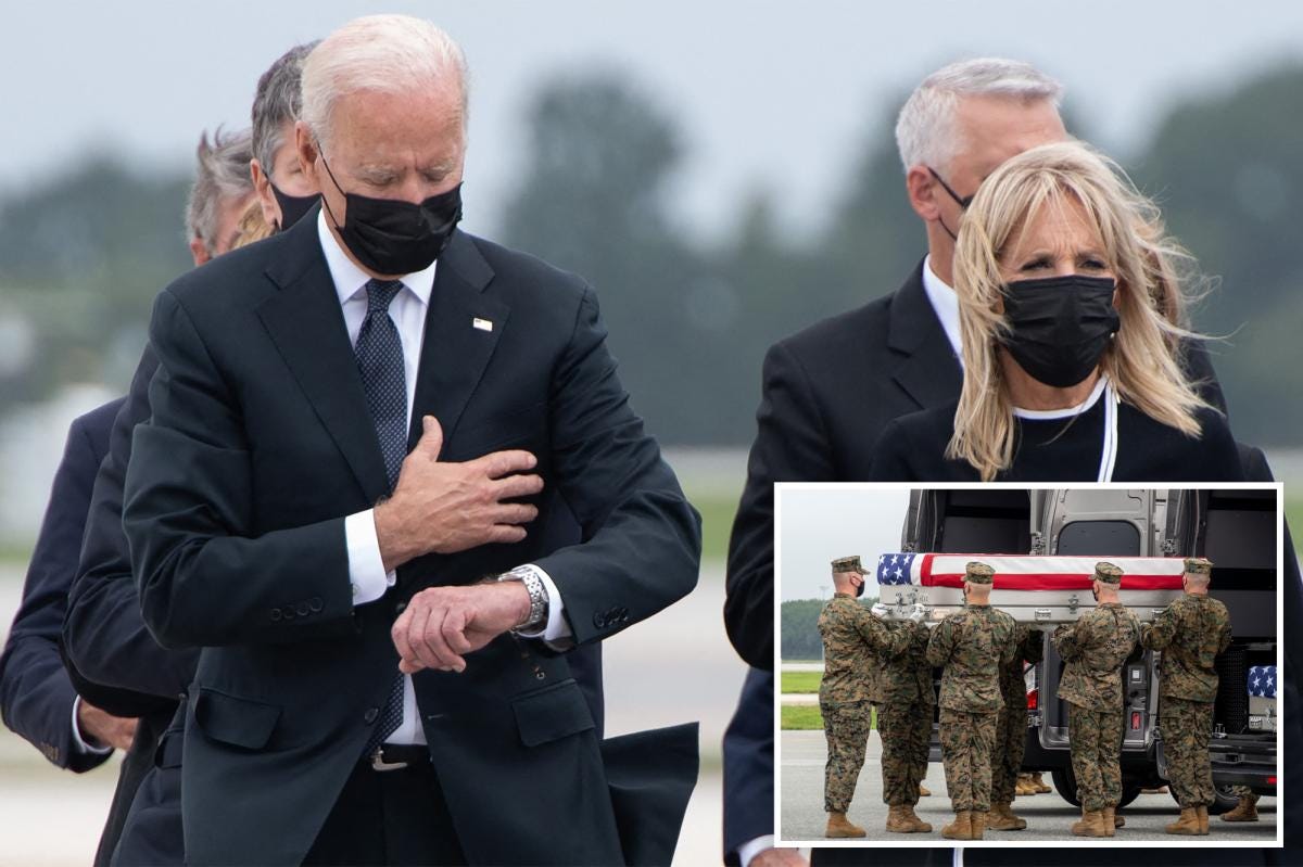 Biden ripped for apparently looking at watch at troops' ceremony