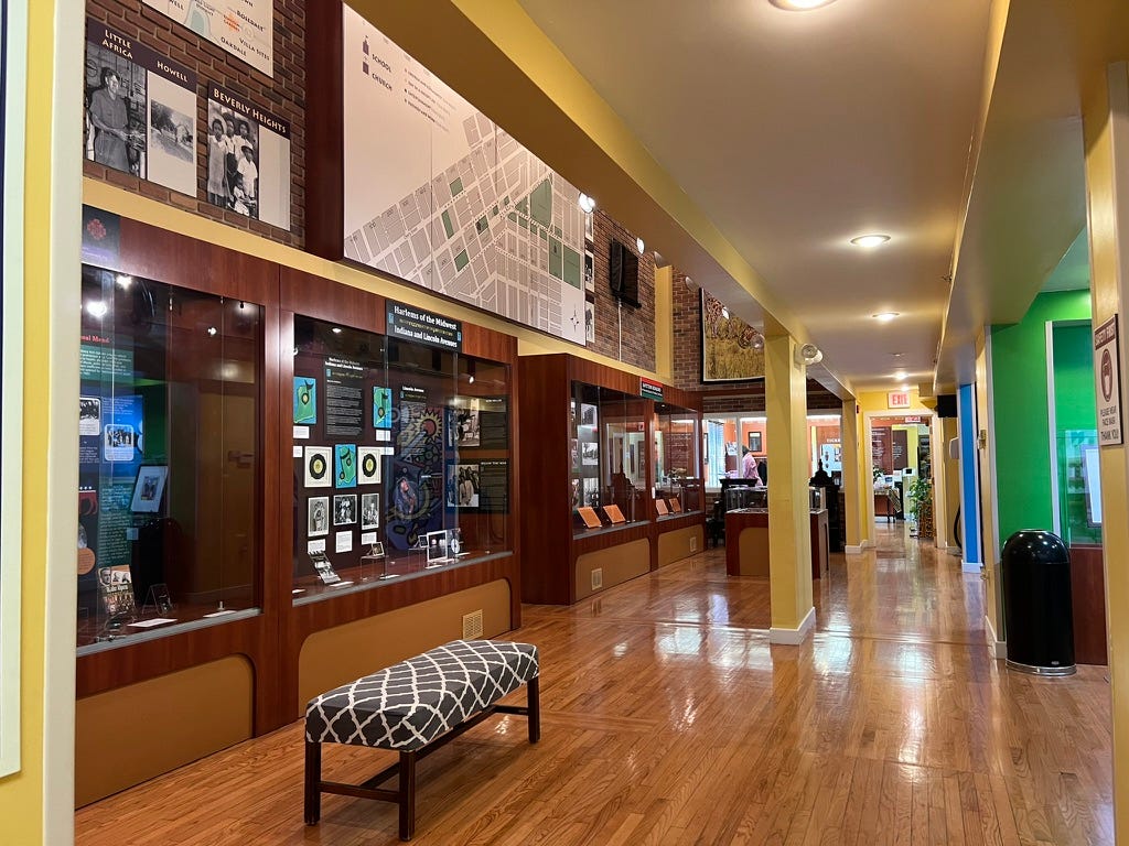 a room of display cabinets in a museum