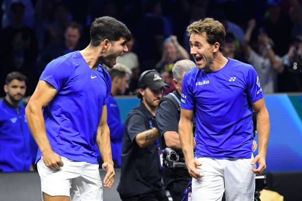 Carlos Alcaraz and Casper Ruud of Team Europe celebrate after winning match point against Ben Shelton and Frances Tiafoe of Team World during the...