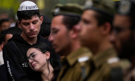 Mourners attending the funeral of Israeli soldier Abraham Cohen at the Mount Herzl cemetery