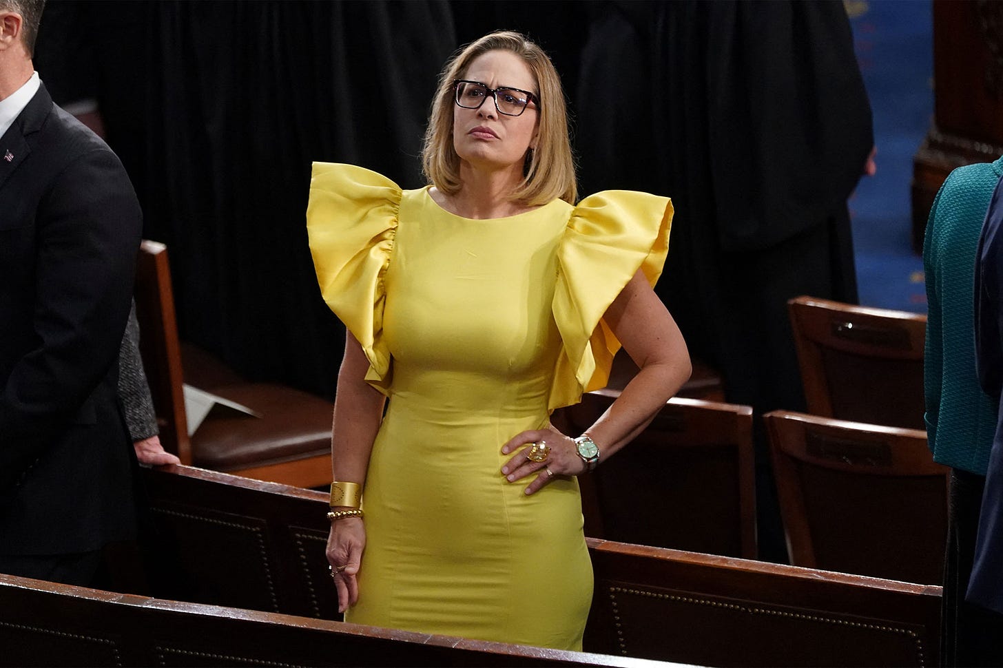 Sen. Kyrsten Sinema's yellow dress at State of the Union ...