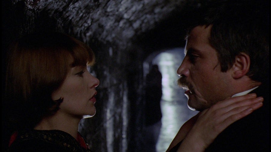 Glenda Jackson puts her hands around Oliver Reed's throat in "Women in Love" (1969)