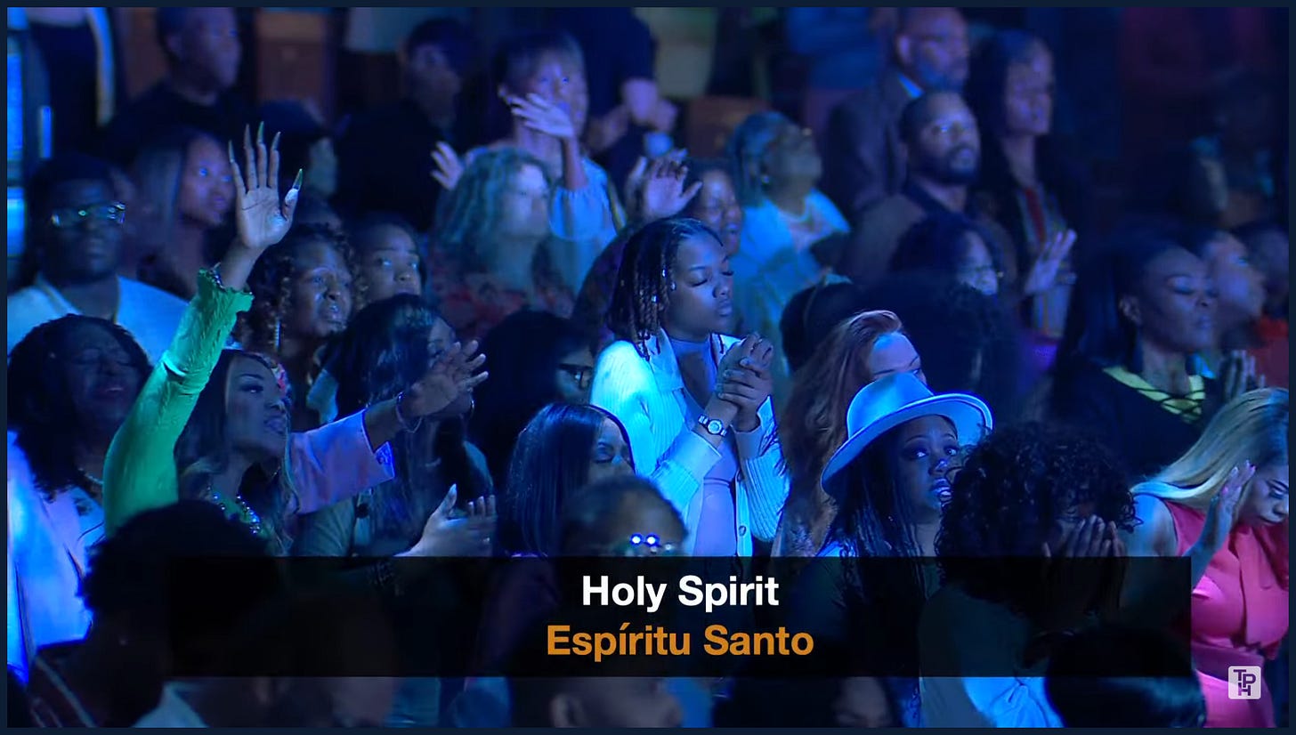 Screenshot of a people worshipping at the Potter's House in Dallas Tx